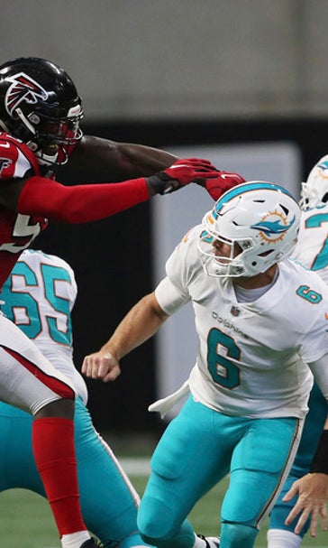Overcoming adversity, Dolphins rejoin playoff race